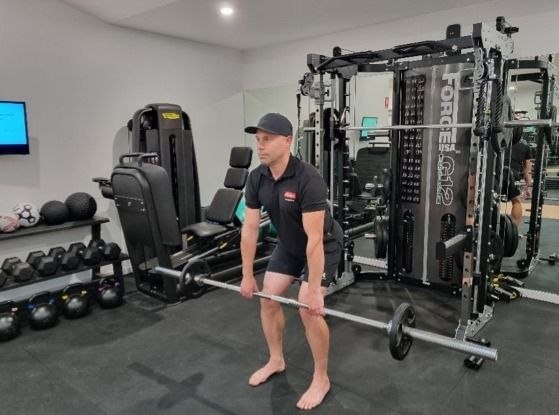 Deadlift training in Aspire's gym