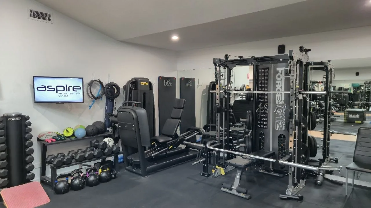 Strength training equipment, dumbbells and kettlebells in Aspire's gym